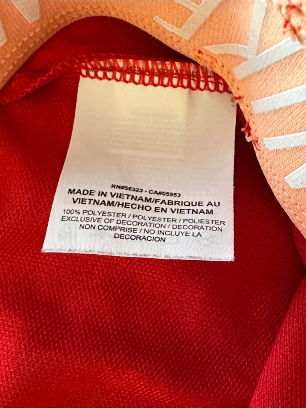 Nike Red Women's Athletic Running Shorts with peach Swoosh